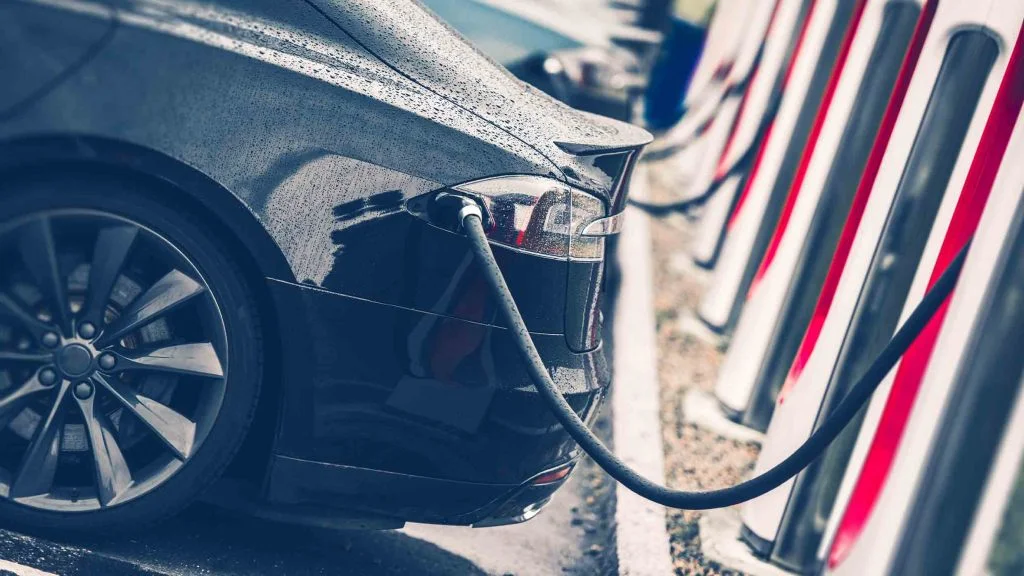 Close up of Tesla public charging station