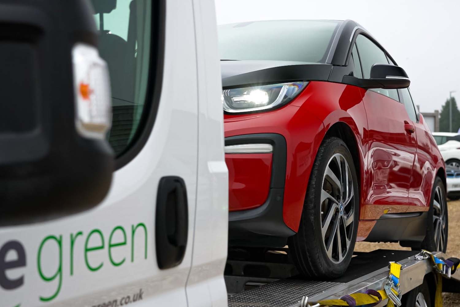 car on transporter for delivery