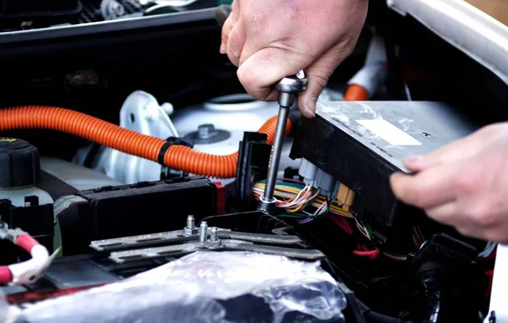 under hood servicing an electric car