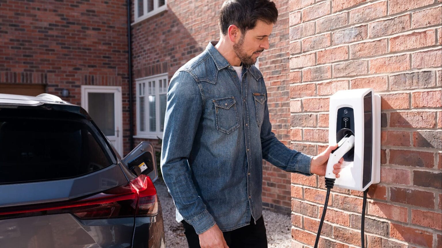 man using an indra smart pro smart ev home charge point