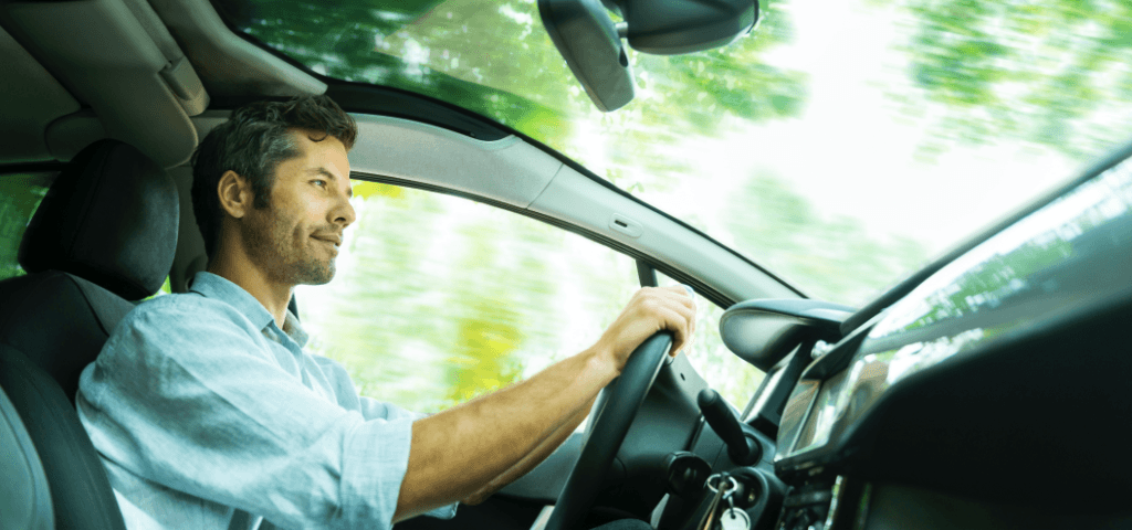man driving in countryside