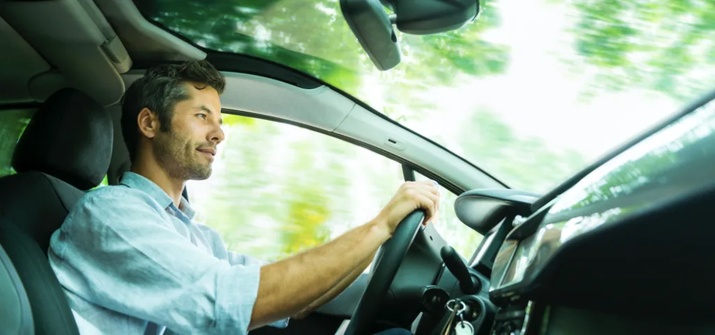 man driving in countryside