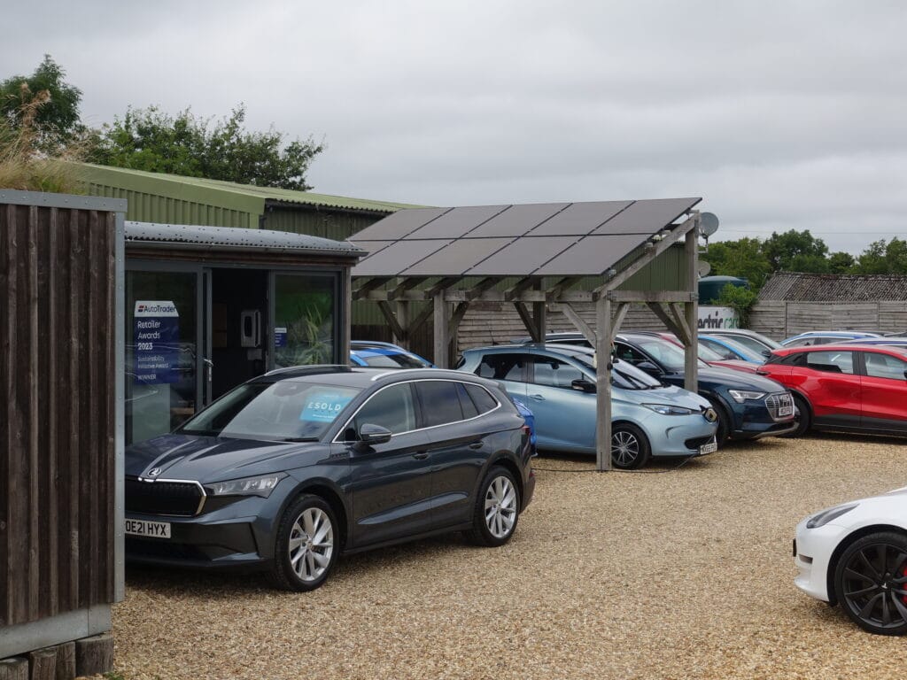 cars outside drive green office