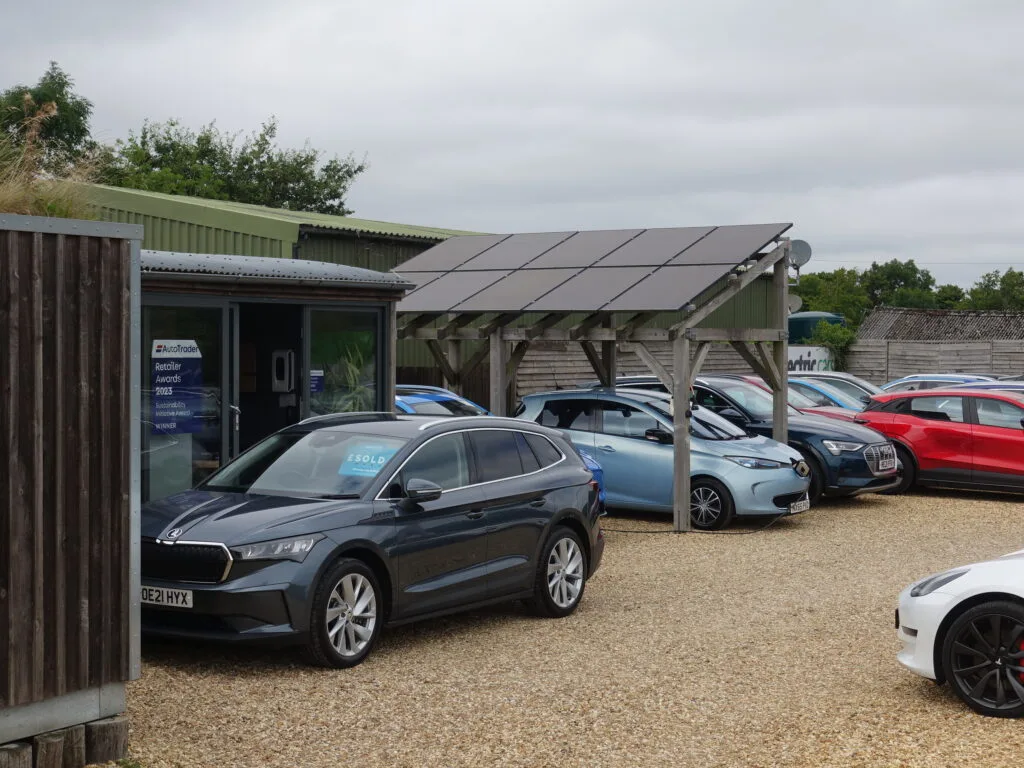 cars outside drive green office