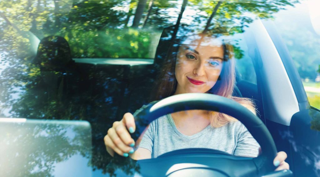 Woman Driving an EV
