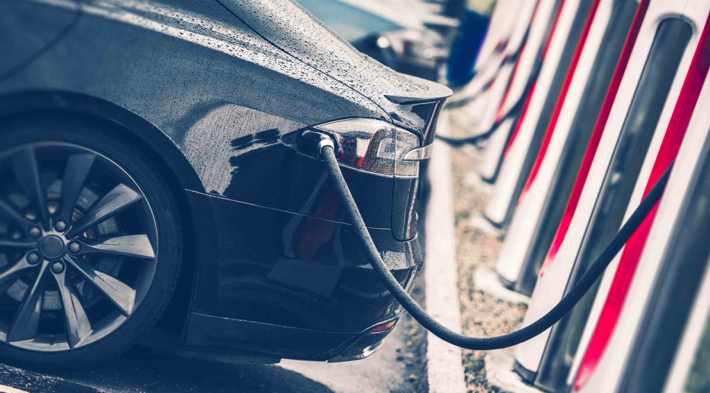 Close up of Tesla public charging station
